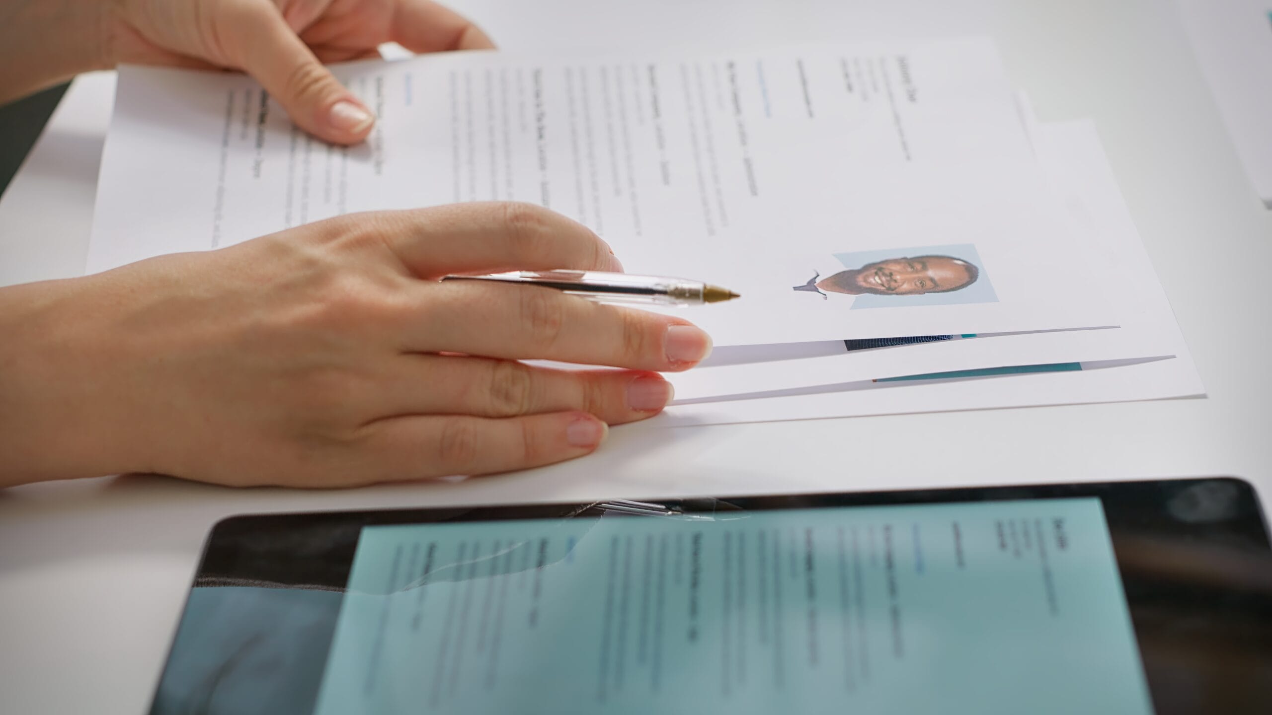 Team of recruiters selecting candidates based on their resumes